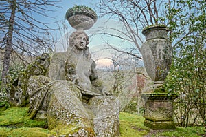 Giant Persephone, statue in famous park of the monsters in Bomarzo Italy photo